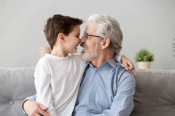 Happy grandfather have fun touch noses with grandchild — Stock Photo, Image