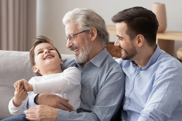 Three generations of men have fun relaxing together — Stock Photo, Image