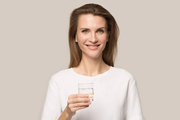 Close up of woman hold glass enjoy pure water — Stock Photo, Image