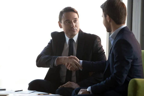 Businessmen handshake signing contract closing successful deal — Stock Photo, Image