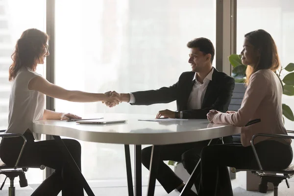 Happy business partners handshake closing deal in office — Stock Photo, Image