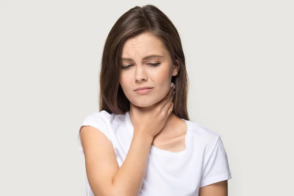 Head shot portrait woman touch neck feels pain in throat — Stock Photo, Image