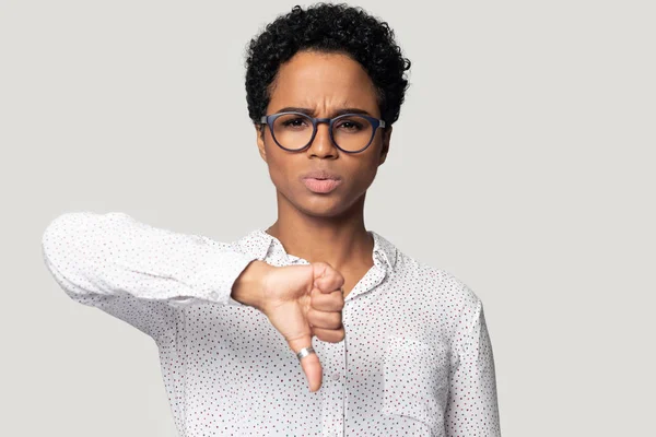 Unhappy biracial woman show thumb down disliking service — Stock Photo, Image