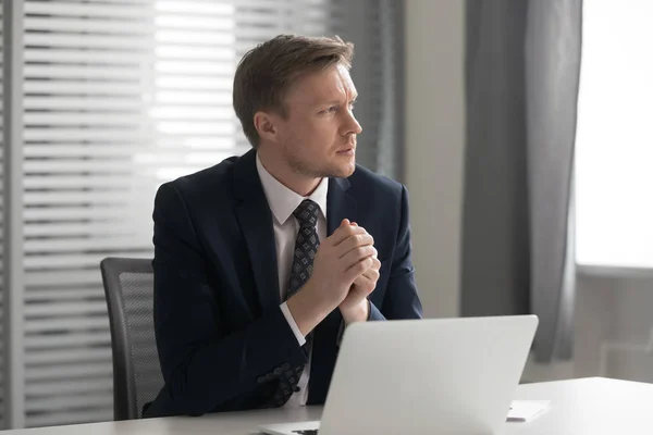 Serious thoughtful businessman feel doubtful concerned about business challenge — Stock Photo, Image
