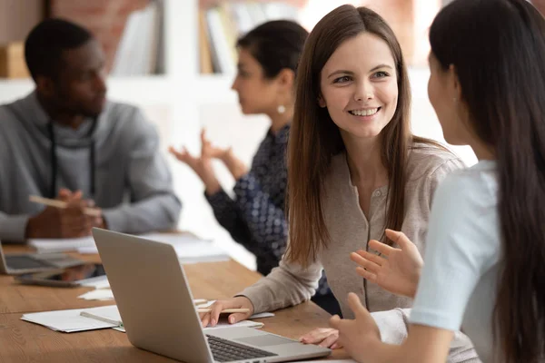 Smiling caucasian student discuss project with mate at lesson — Stock Photo, Image