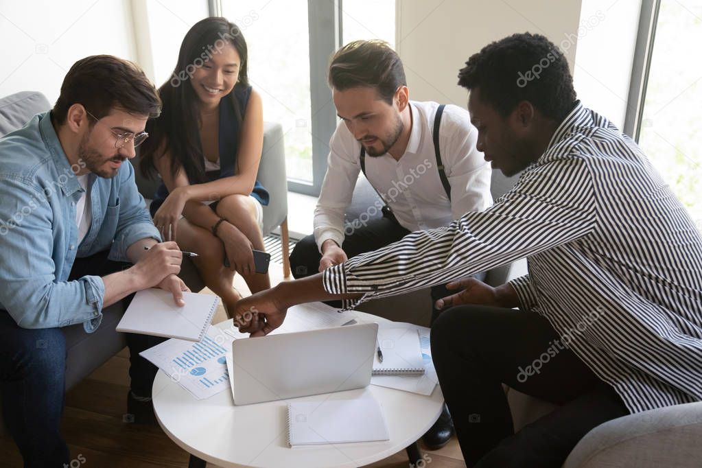 African leader mentor teaching diverse workers at corporate group briefing