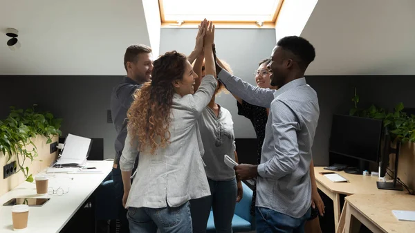 Diverse office business team give high five share corporate success — Stock Photo, Image