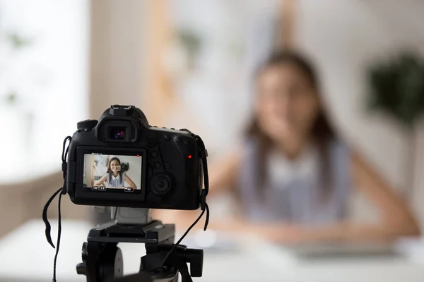 Professional camera shooting female coach filming video blog — Stock Photo, Image
