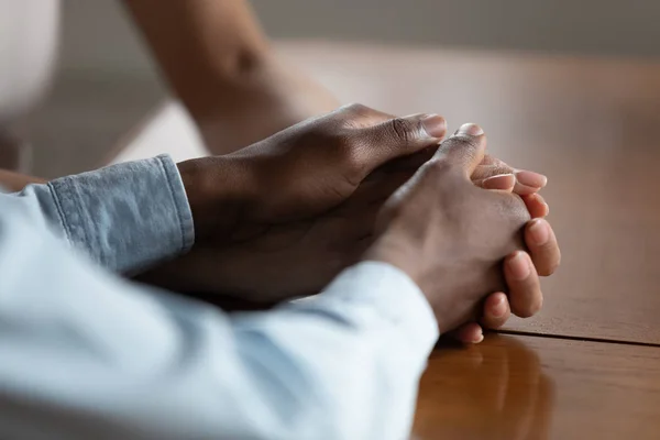 Close up of biracial couple hold hands showing love — Stock Photo, Image