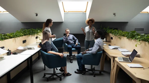 African team leader telling about new project to diverse staff — Stock Photo, Image