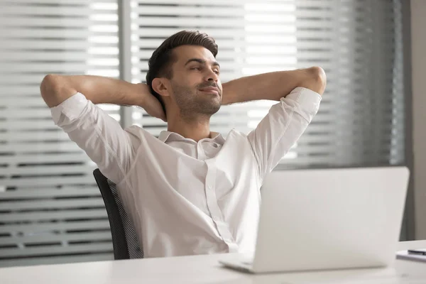 Satisfied businessman in comfortable office chair during break — Stok fotoğraf