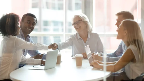 Diverse business partners handshake get acquainted at briefing — Stock Photo, Image
