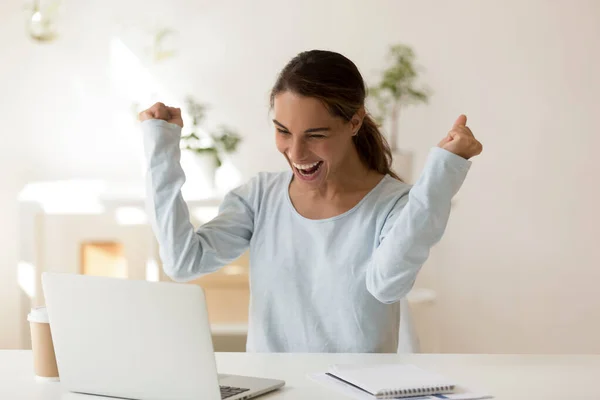 Euphoric laughing mixed race millennial female student making yes gesture. — Stock Photo, Image