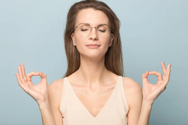 Calm millennial woman meditate breathing fresh air — Stock Photo, Image
