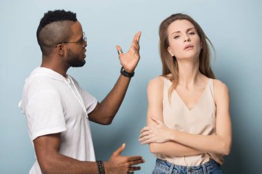 Multiracial millennial couple fight having relationships problems clipart