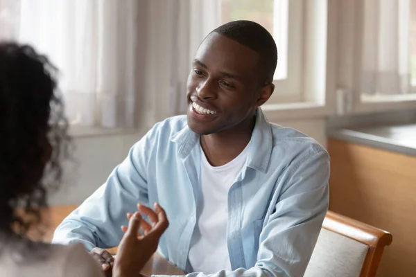 Happy african american man discussing family household issues with wife. — Stock Photo, Image