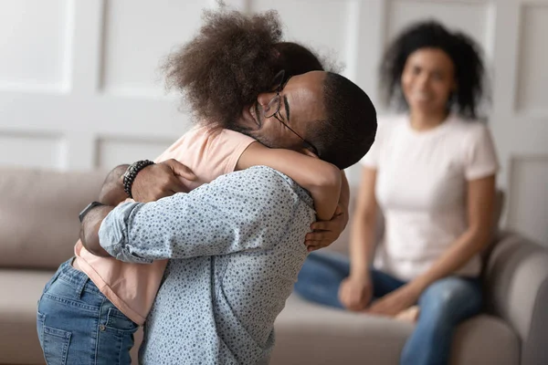 Happy little girl hug dad reunited after separation — Stock Photo, Image