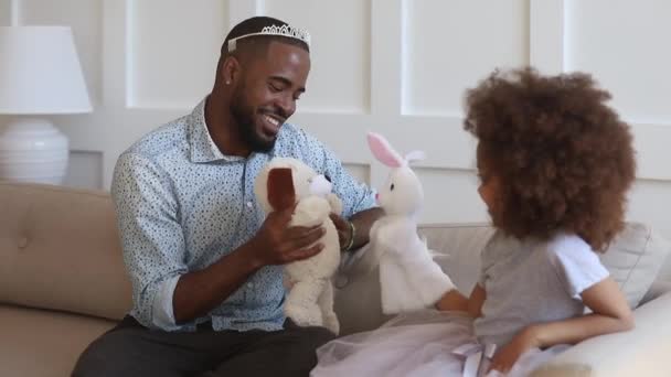 Happy african young father and little kid daughter playing together — Stock video