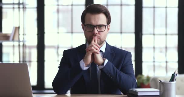 Thoughtful 30s businessman in formal wear looking at camera. — 비디오