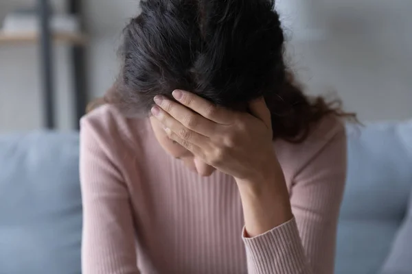 Close up unhappy depressed young woman touching forehead — Stock Photo, Image