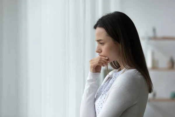 Pensive sad woman standing thinking over problems search solution — Stock Photo, Image