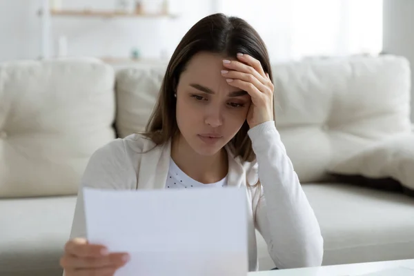 Woman holding letter read unpleasant news from friend or relative — Stock Photo, Image
