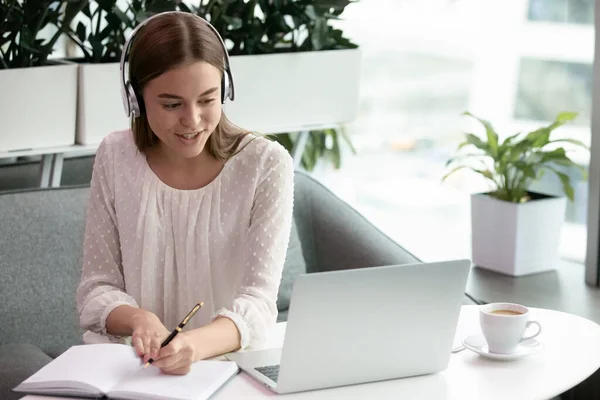 Woman in headphones communicate video calling — Stock Photo, Image