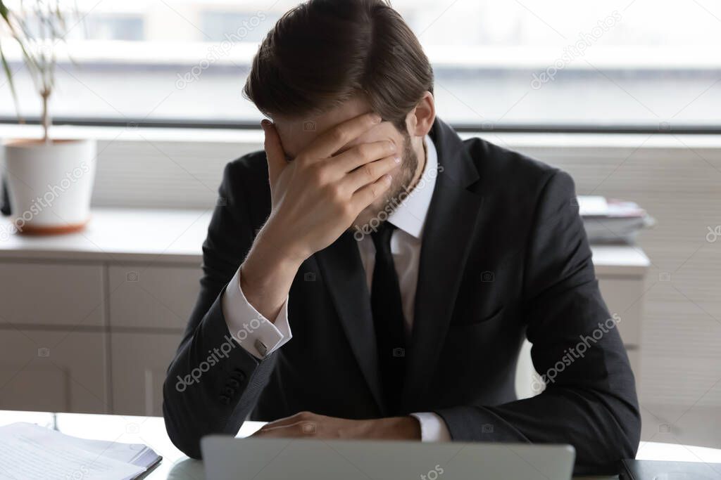 Frustrated businessman stressed with company business failure