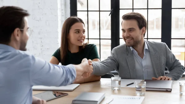 European businessmen shake hands greets each other starting negotiations — Stock Photo, Image