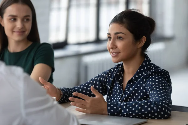 Indian applicant is interviewed by HR managers during job interview