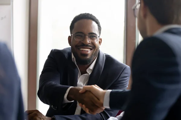 Multiracial businessmen express respect shake hands start negotiations — Stock Photo, Image