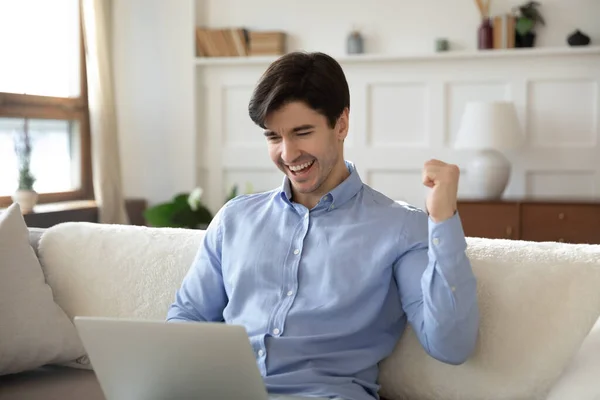 Euphoric young man feeling excited of good news. — Stock Photo, Image