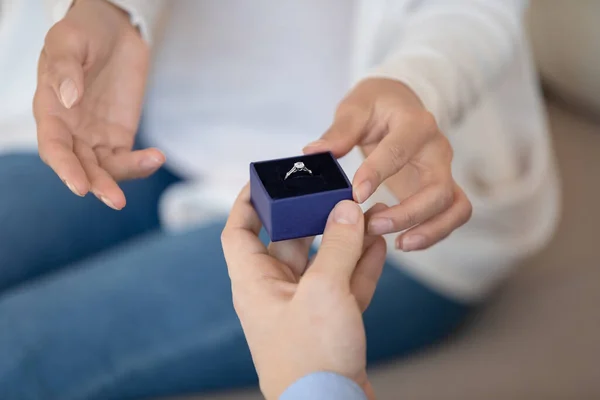 Close up young man making proposal to beloved woman. — Stock Photo, Image