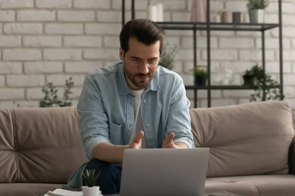 Young man have webcam conference online on laptop — Stock Photo, Image