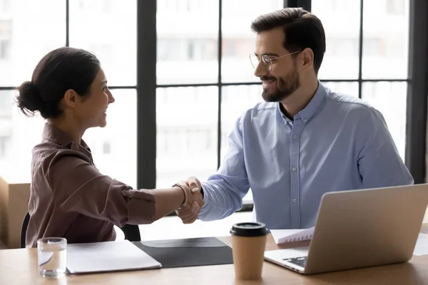 Diverse young business people making agreement in office. — Stock Photo, Image