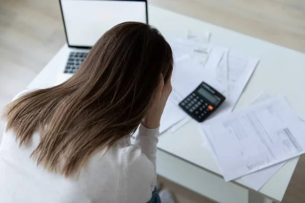 Stressed millennial woman feeling confused of banking debt. — Stock Photo, Image