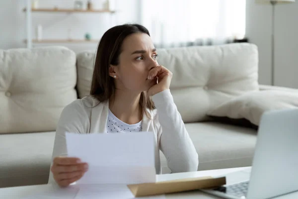Frustrated young woman thinking of financial problems. — Stock Photo, Image