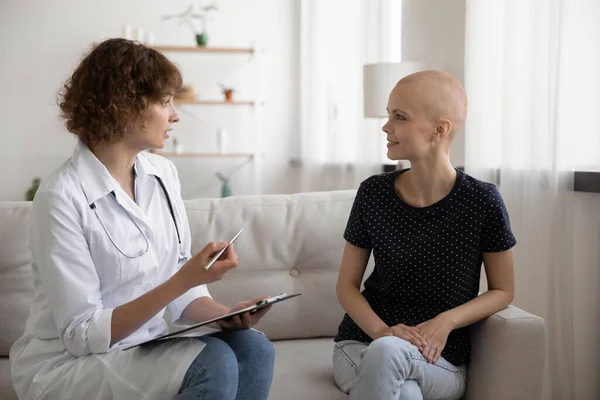 Doctor talk consult sick female cancer patient