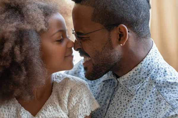 Happy peaceful african american family enjoying tender lovely moment. — Stock Photo, Image