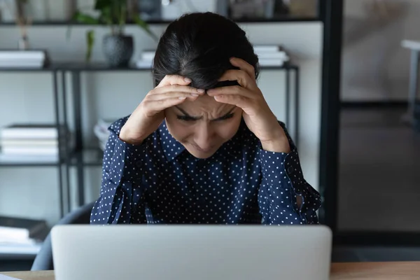 Stressed indian female employee have problems at workplace — Stock Photo, Image