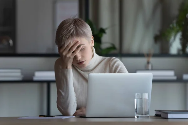 Exhausted female employee fall asleep at workplace — Stock Photo, Image