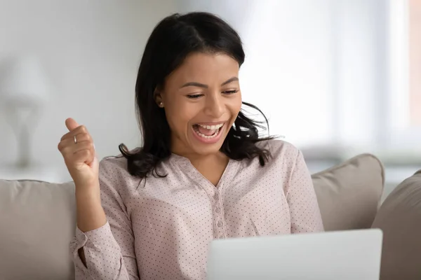 Excited African American woman triumph with online lottery win — Stock Photo, Image