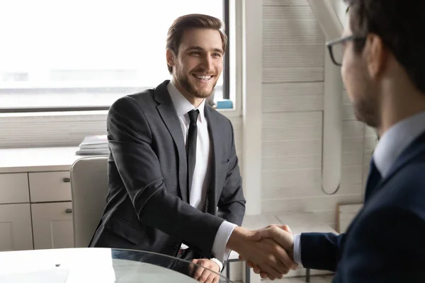 Happy two businessmen celebrating making agreement in office. — Stock Photo, Image