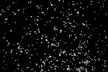 Gıda Pullar düz bir yüzeye veya tablo üzerinde yayılmış tuz veya badem veya buğday unu gibi silüeti. Siyah arka plan üzerine izole soyut grenli doku. Toz, kum darbe veya ekmek kırıntısı Üstten Görünüm. 