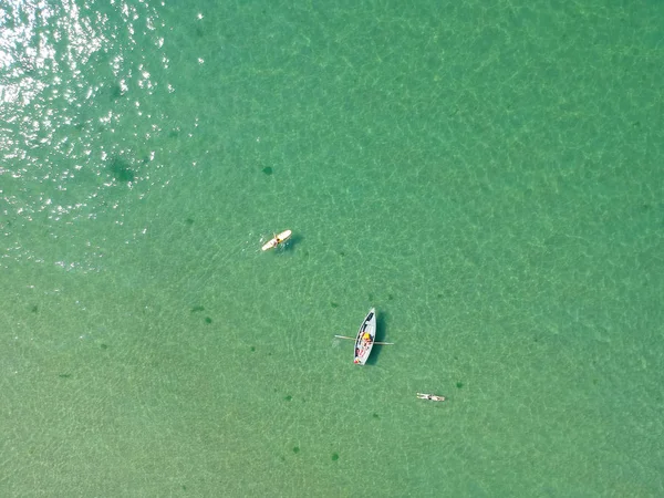 Aerial view on the sea and boat. Beautiful natural seascape at the summer time from bird eye view. Aerial.