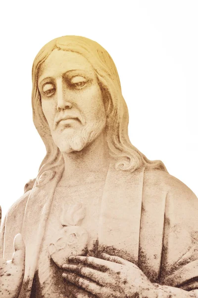 Stature depicting Sacred Heart of Jesus. Stone sculpture of  dev