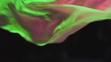 Gerçek gibi dikişsiz tekstil yüzey bezi havada sallayarak, soyut renk arka plan, trendy canlı doku renklerde dalgalı yüzey dalgalanmaları. Moda konsept bez malzeme arka plan.