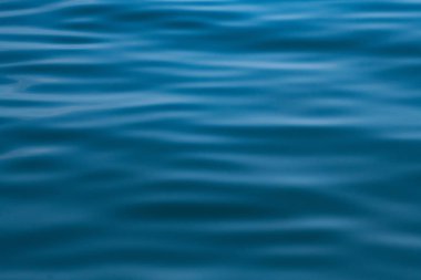 Soyut hareket dalga su güneş ışığı arka plan ile Okyanusu