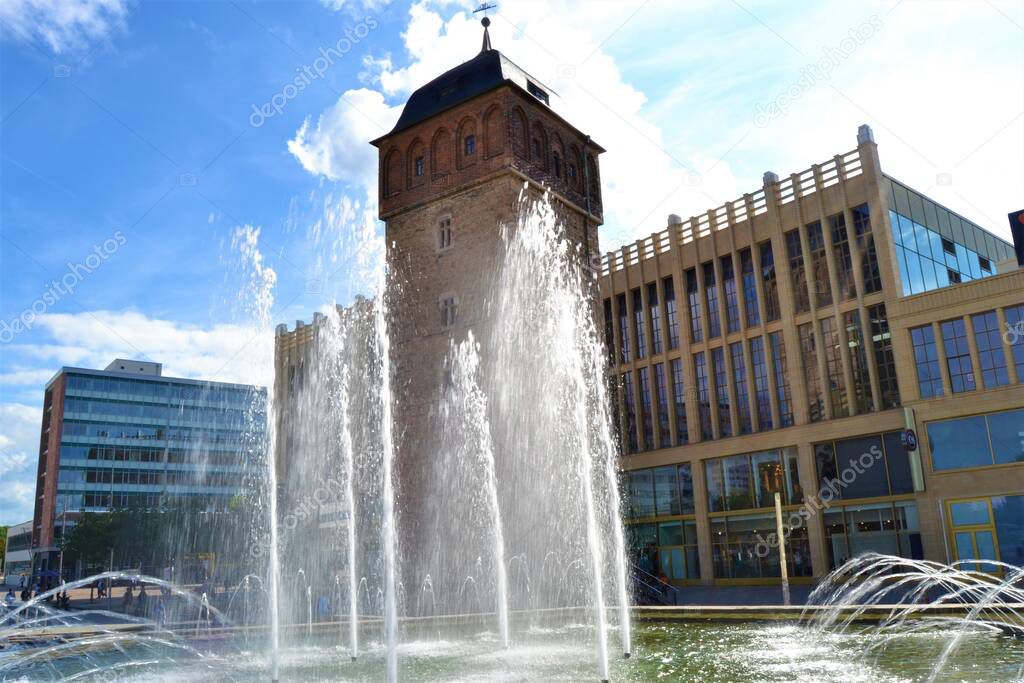 Ancient Red Tower in Chemnitz, Germany. Roter turm (Red Tower) and fountain in front of it in Chemnitz. 