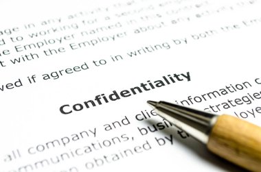 Confidentiality agreement with wooden pen clipart